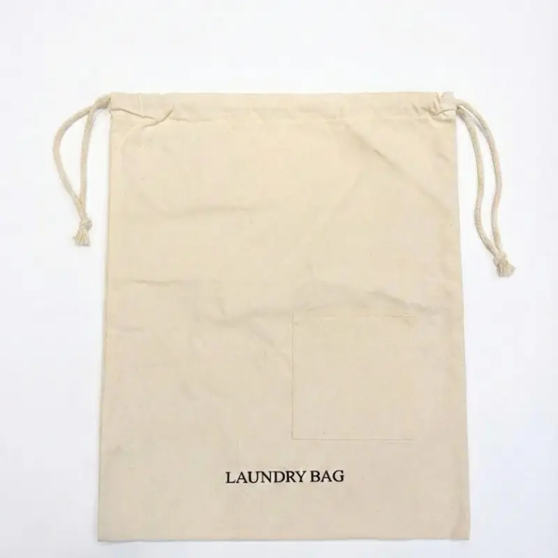 Front view of 8oz cotton hotel laundry bag featuring a 15.2cm pocket and LAUNDRY BAG embroidery.